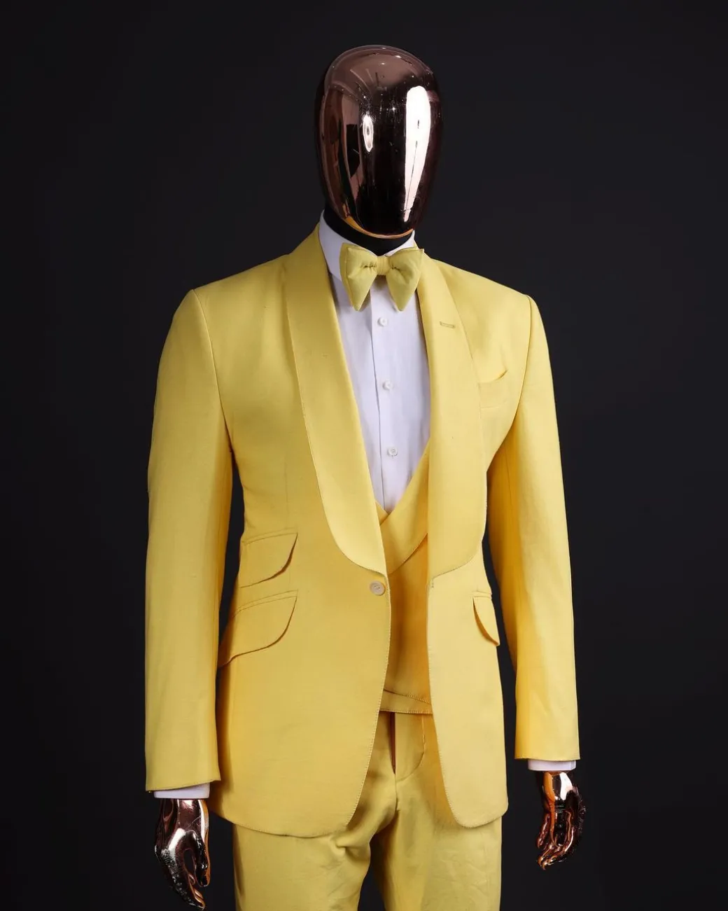 A Middle yellow linen shawl lapel jacket, cross cut unbalanced wrapped waistcoat, bow tie & Gurkha pant Trouser