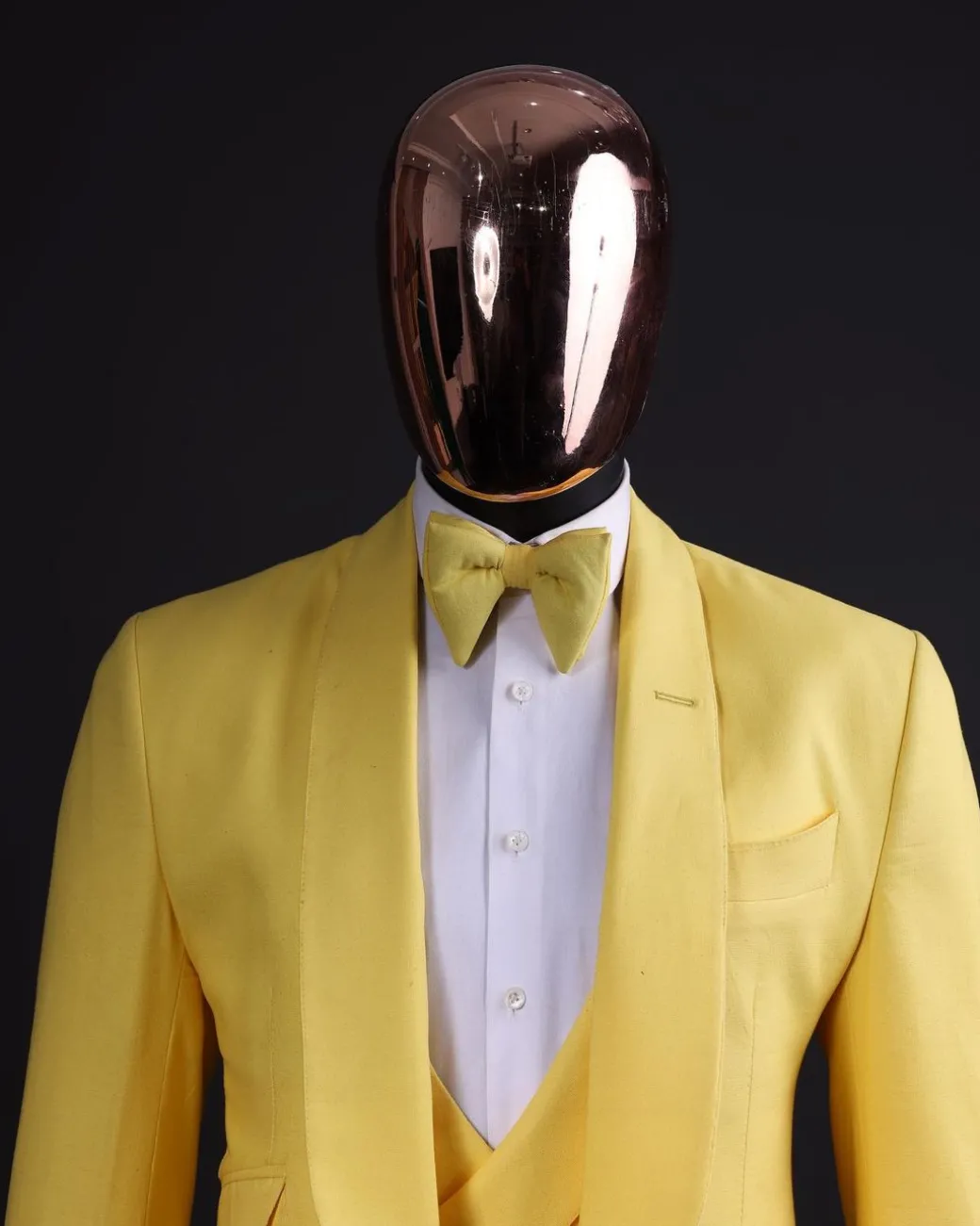 A Middle yellow linen shawl lapel jacket, cross cut unbalanced wrapped waistcoat, bow tie & Gurkha pant Trouser
