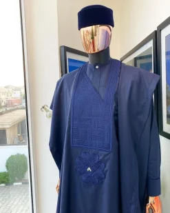 A Midnight Blue Agbada with a maze line Japanese intersection design, senator kaftan with Swarovski button details and sokoto