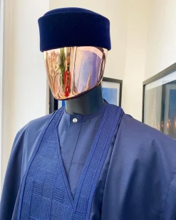 A Midnight Blue Agbada with a maze line Japanese intersection design, senator kaftan with Swarovski button details and sokoto