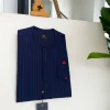 A Midnight Blue and Tomato red Pencil stripe, clear view red Swarovski buttons, front flap, patch pocket details African traditional senator kaftan native.