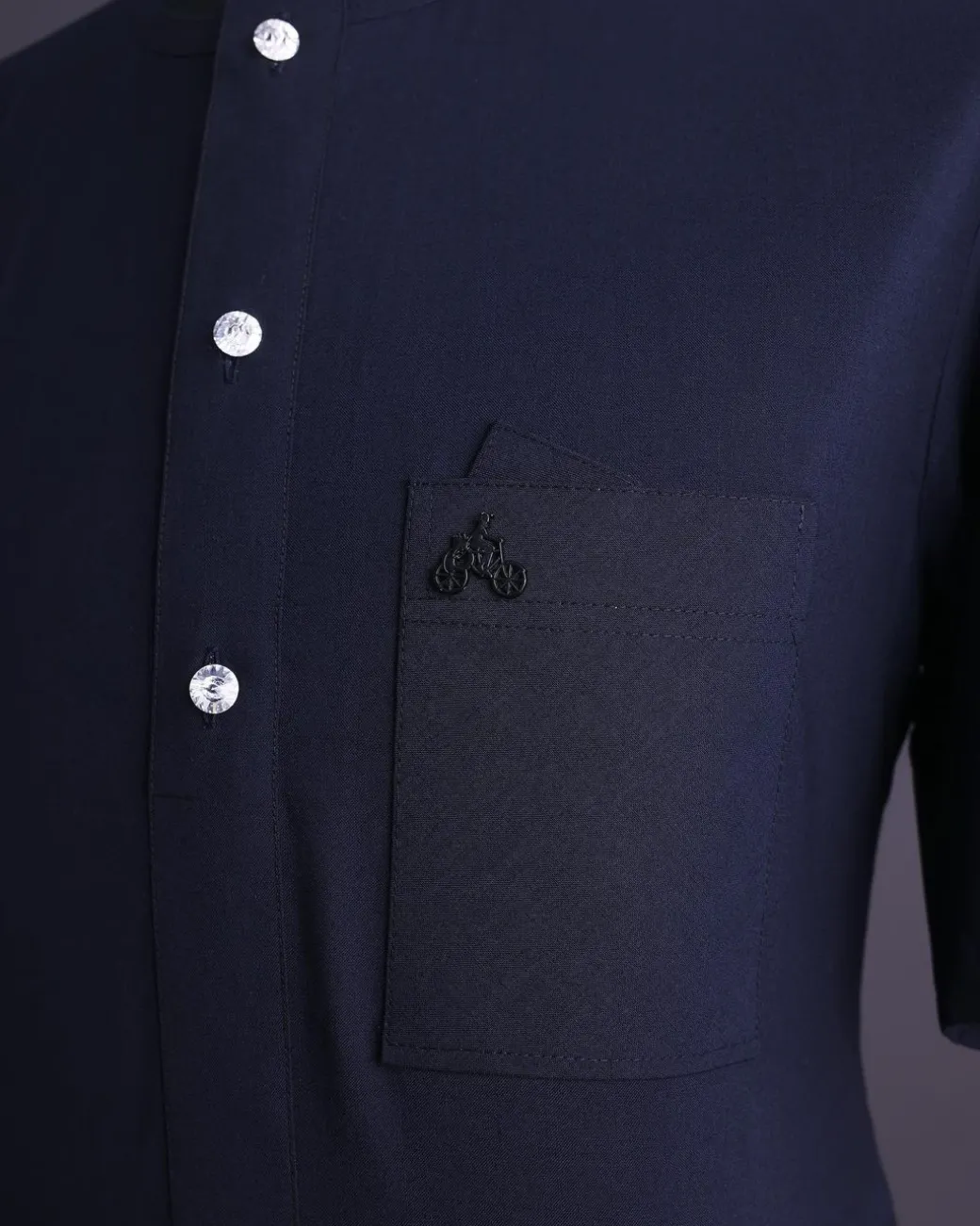 A Midnight blue, brown Aaron wool, front flap with silver Swarovski button, shorts sleeve African senator kaftan native.