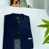 A midnight blue front flap with a clear view Swarovski button detail African traditional senator Kaftan native