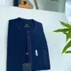 A midnight blue front flap with a line embroidery detail African traditional senator kaftan native
