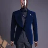 A Midnight Blue, Soaked Velvet Fabric, Knitted, Wide Peak Lapel Tuxedo Suit.