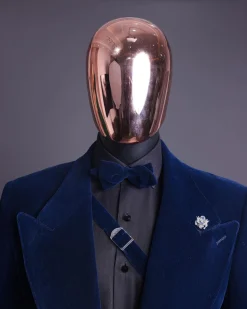 A Midnight Blue, Soaked Velvet Fabric, Knitted, Wide Peak Lapel Tuxedo Suit.