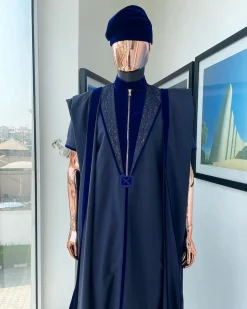 A Midnight blue, vehicular lapelled with zip line flap & navy blue soaked Italian velvet mix embroidery design details agbada