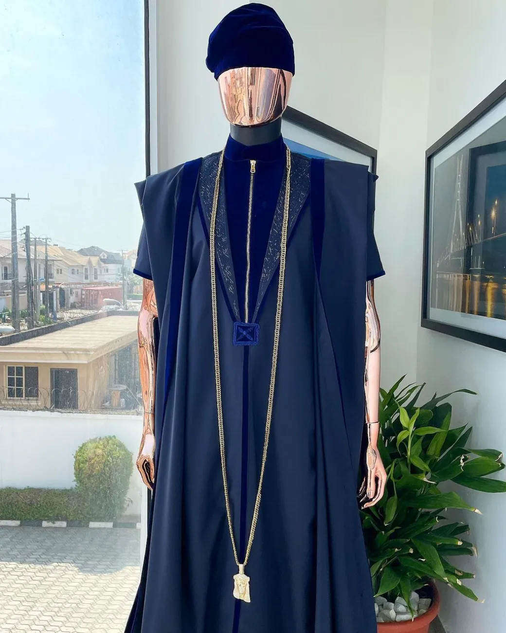 A Midnight blue, vehicular lapelled with zip line flap & navy blue soaked Italian velvet mix embroidery design details agbada