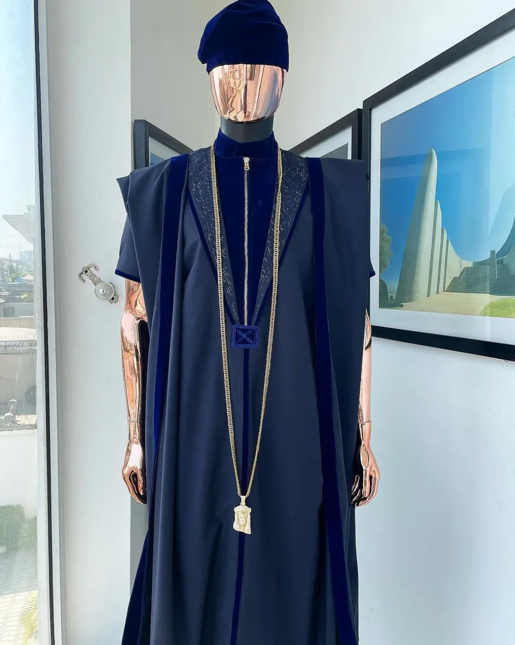 A Midnight blue, vehicular lapelled with zip line flap & navy blue soaked Italian velvet mix embroidery design details agbada