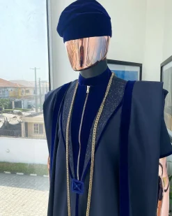 A Midnight blue, vehicular lapelled with zip line flap & navy blue soaked Italian velvet mix embroidery design details agbada