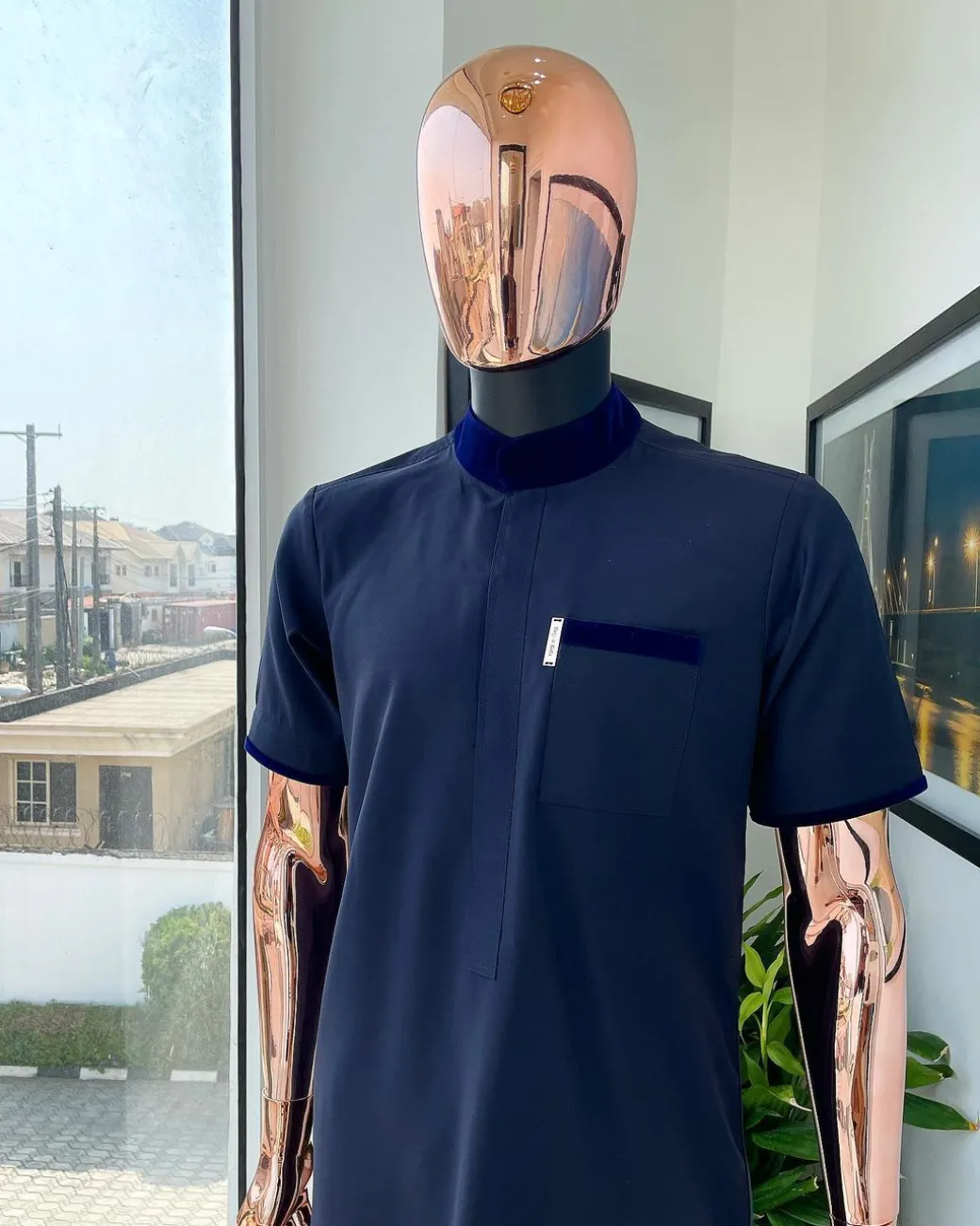 A Midnight blue, vehicular lapelled with zip line flap & navy blue soaked Italian velvet mix embroidery design details agbada