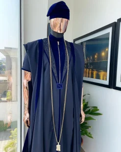 A Midnight blue, vehicular lapelled with zip line flap & navy blue soaked Italian velvet mix embroidery design details agbada
