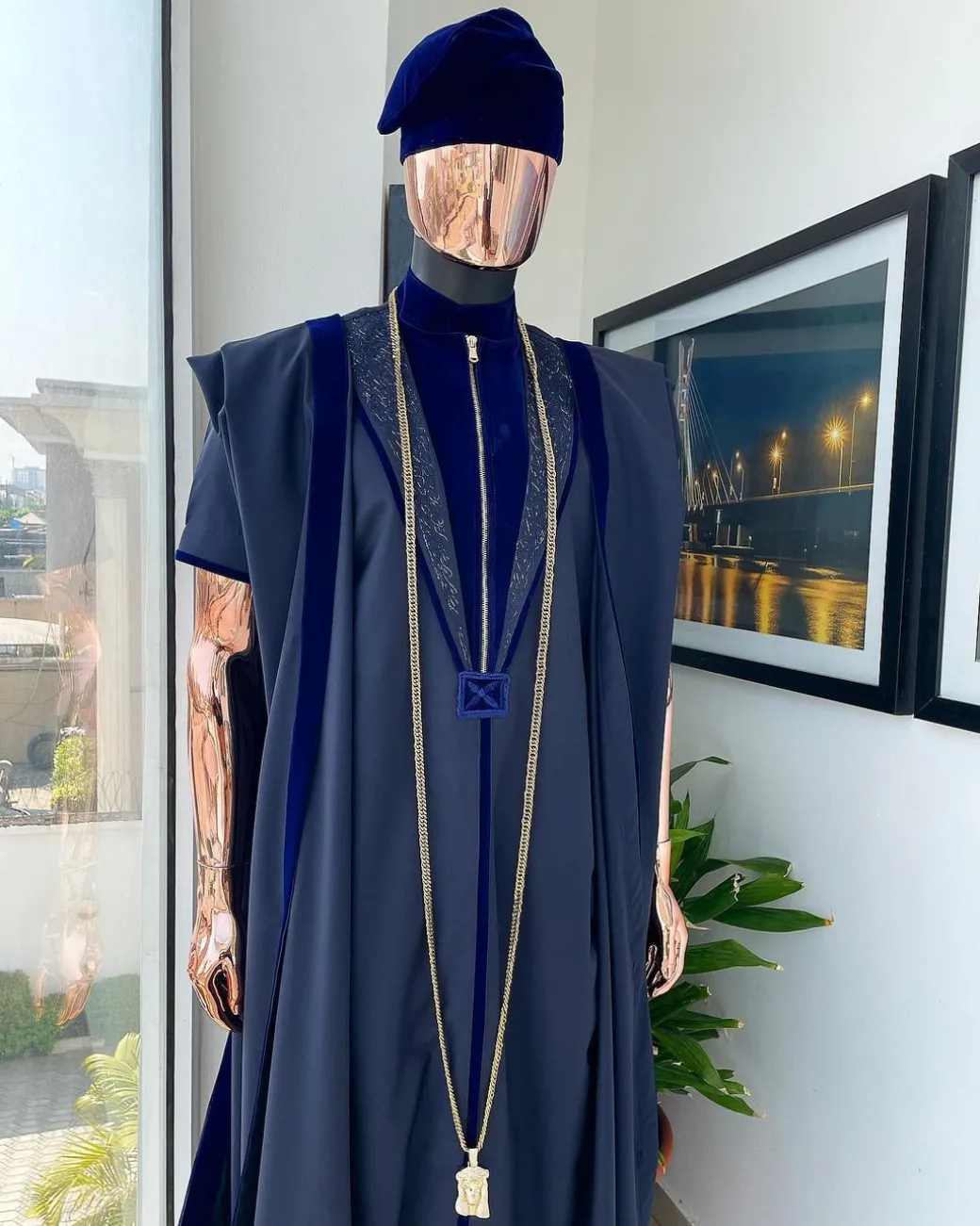 A Midnight blue, vehicular lapelled with zip line flap & navy blue soaked Italian velvet mix embroidery design details agbada