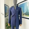 A Mikado Silk “rumble in jungle”, wrap Notch lapel, slant sache blazer suit.