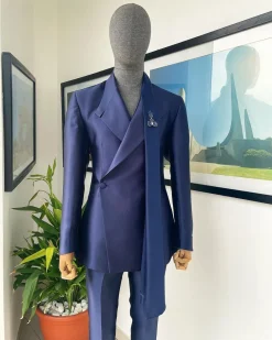 A Mikado Silk “rumble in jungle”, wrap Notch lapel, slant sache blazer suit.