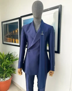 A Mikado Silk “rumble in jungle”, wrap Notch lapel, slant sache blazer suit.