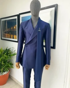A Mikado Silk “rumble in jungle”, wrap Notch lapel, slant sache blazer suit.