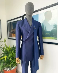 A Mikado Silk “rumble in jungle”, wrap Notch lapel, slant sache blazer suit.