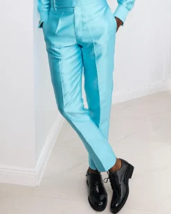 A Mikado Silk, turquoise blue, Gurkha pant with covered belt jab.