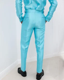 A Mikado Silk, turquoise blue, Gurkha pant with covered belt jab.