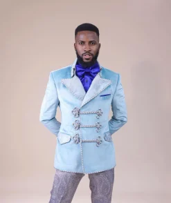 A “Milano” Skye blue, double breasted with matching gold floral detailing, hand knitted buttons