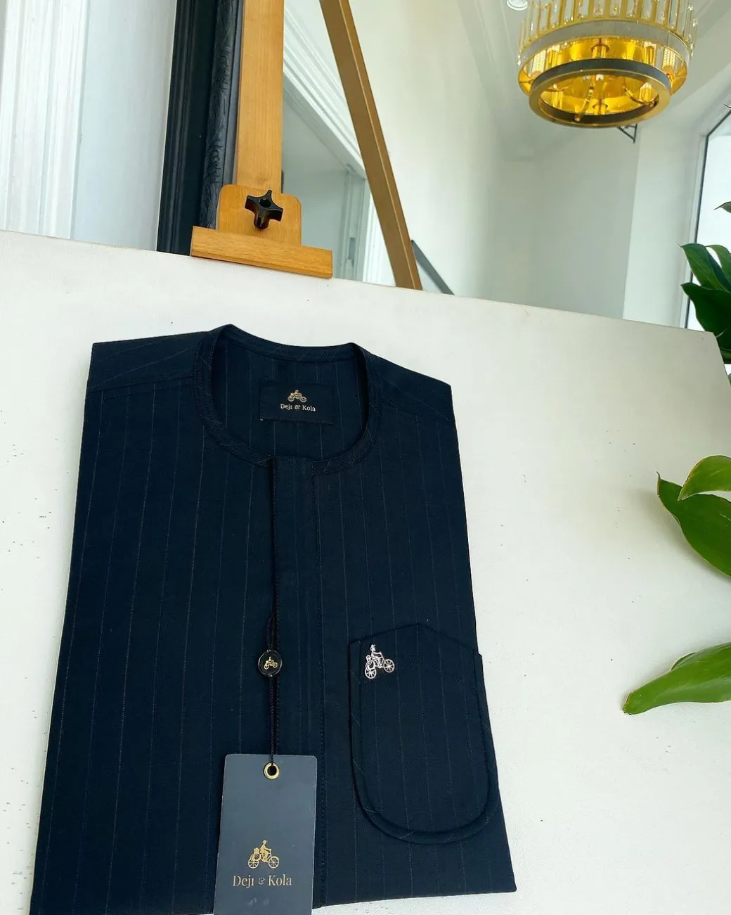 A Mix of Blue & Grey Stripe, V shaped patch pocket details African traditional senator kaftan native.