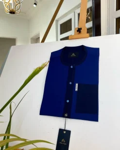 A Mixed shade of blue with a clear view of Swarovski buttons African kaftan and Sokoto