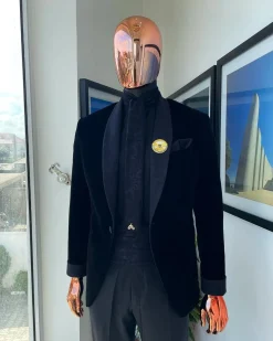A monochrome charcoal black shawl lapel soaked Italian velvet tuxedo suit