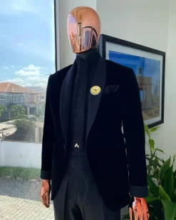 A monochrome charcoal black shawl lapel soaked Italian velvet tuxedo suit