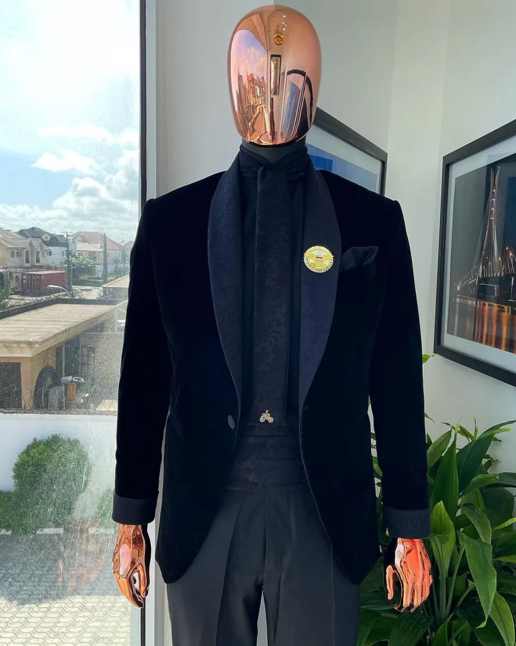 A monochrome charcoal black shawl lapel soaked Italian velvet tuxedo suit