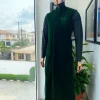 A monochrome forest green long senator kaftan, Soaked premium velvet kimono with Black Swarovski button details & matching velvet round cap.