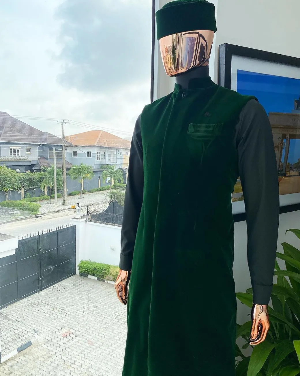 A monochrome forest green long senator kaftan, Soaked premium velvet kimono with Black Swarovski button details & matching velvet round cap.