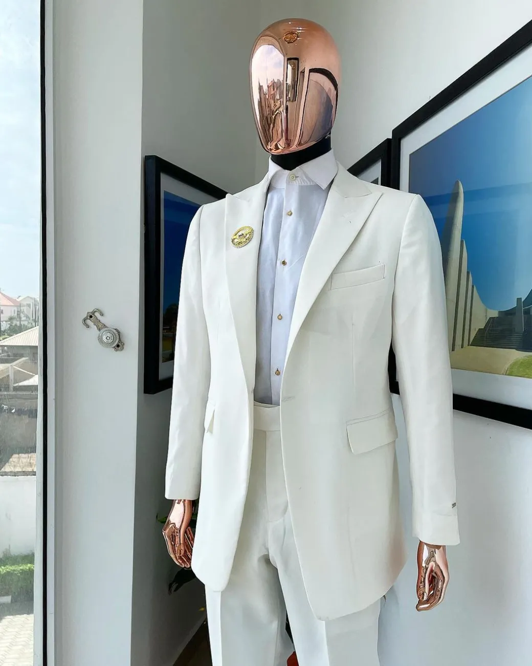 A Monochrome ivory white peak lapel suit
