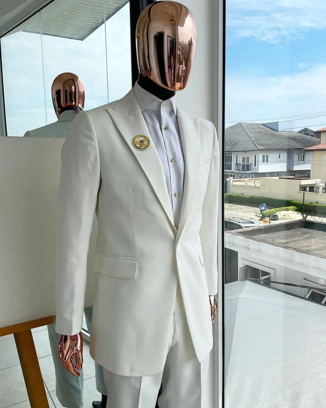 A Monochrome ivory white peak lapel suit