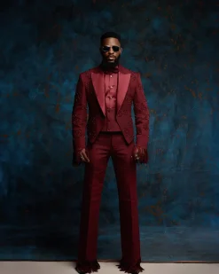 A monochrome, knitted, hand-woven aso-oke, matching bead layering tuxedo suit