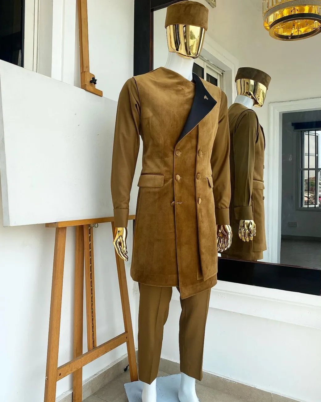 A monochrome light brown Greek military jacket, senator kaftan and sokoto from “Ayeye” Ijade 20/21 “Balogun”