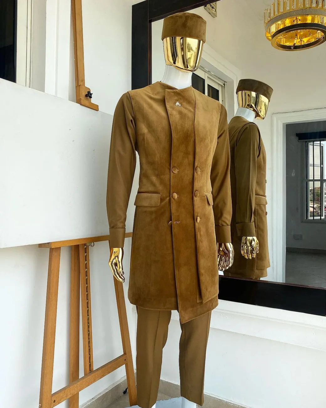 A monochrome light brown Greek military jacket, senator kaftan and sokoto from “Ayeye” Ijade 20/21 “Balogun”