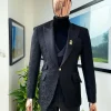 A monochrome “Mandarin” dispersed floral charcoal black peak lapel tuxedo jacquard suit