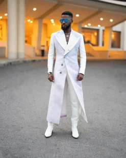 A monochrome, peak lapel, light multi-color dyed trench double breasted jacquard with bunny button details suit