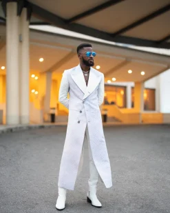 A monochrome, peak lapel, light multi-color dyed trench double breasted jacquard with bunny button details suit