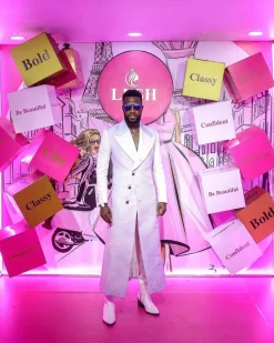 A monochrome, peak lapel, light multi-color dyed trench double breasted jacquard with bunny button details suit