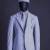 A monochrome seersucker (rail road stripe) notch lapel suit