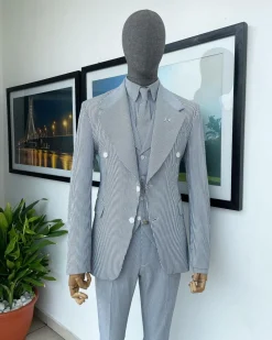 A monochrome seersucker (rail road stripe) notch lapel suit
