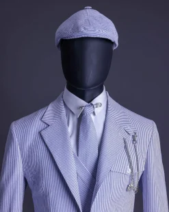 A monochrome seersucker (rail road stripe) notch lapel suit