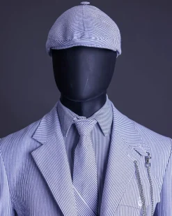 A monochrome seersucker (rail road stripe) notch lapel suit