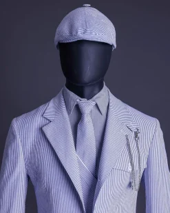 A monochrome seersucker (rail road stripe) notch lapel suit