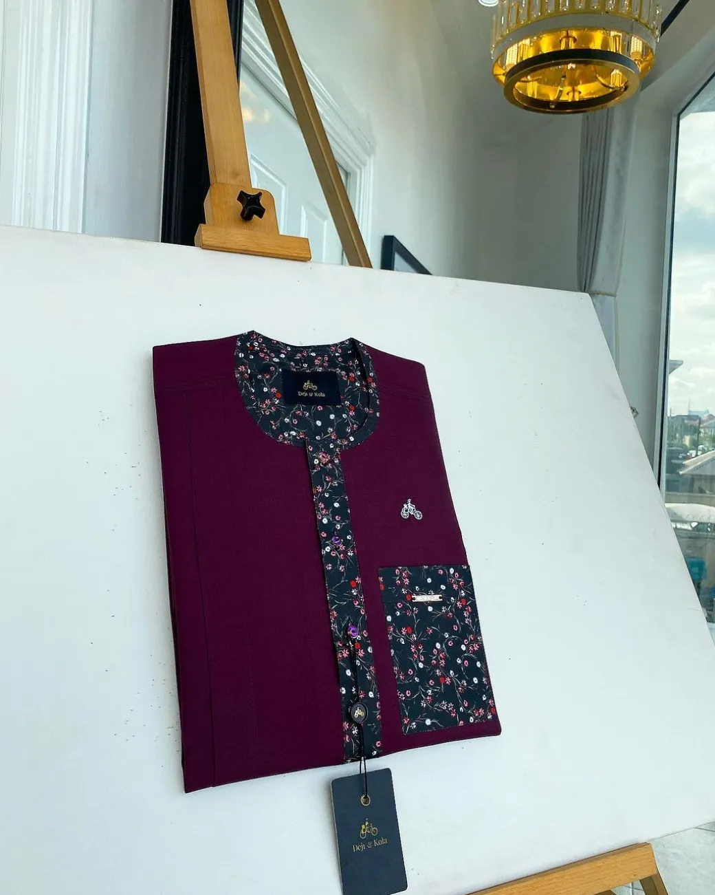 A Mulberry front flap with a clear view of a purple Swarovski button, a paisley-related purple flap and a pocket senator kaftan native