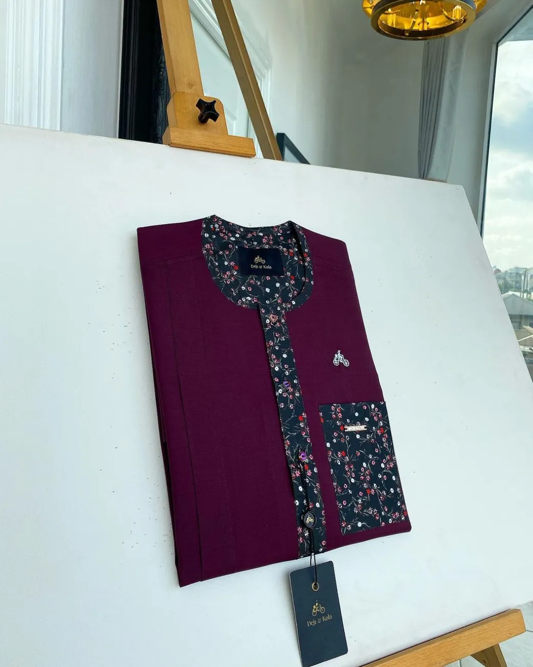 A Mulberry front flap with a clear view of a purple Swarovski button, a paisley-related purple flap and a pocket senator kaftan native