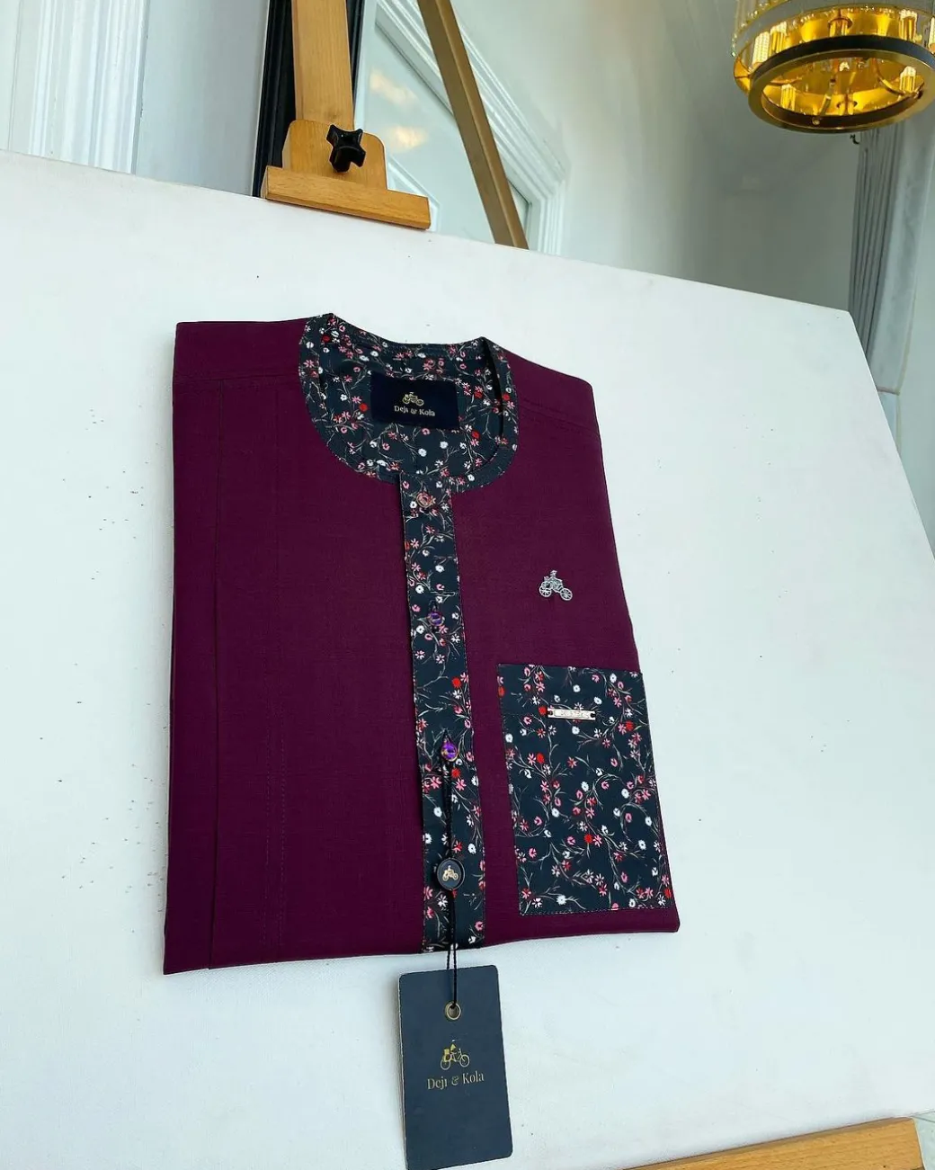 A Mulberry front flap with a clear view of a purple Swarovski button, a paisley-related purple flap and a pocket senator kaftan native