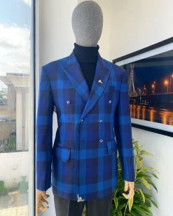 A multicolor shade of blue windowpane check double breasted Peak lapel suit